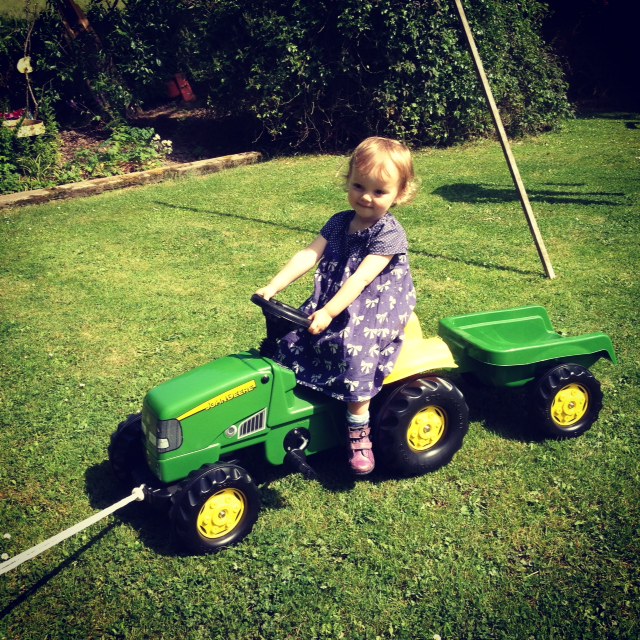 Toddler on a tractor