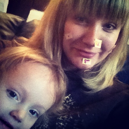 What I'm doing when I'm not blogging or working - being covered in stickers by my toddler.