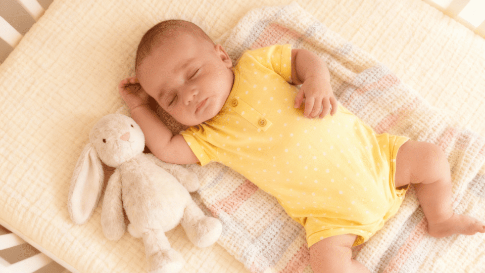 feature image what is the best sleeping position for a babys stuffy nose