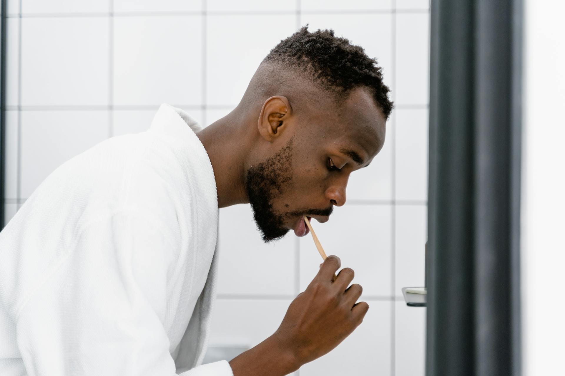 A man brushing his teeth