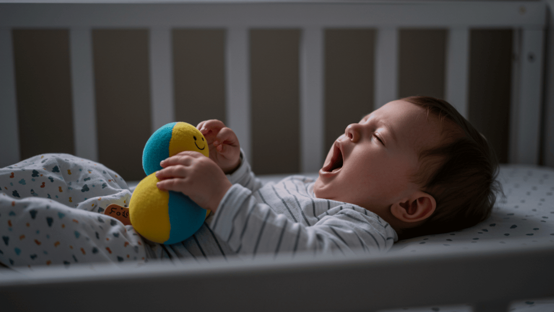 when to take a stuffed animal out of the crib