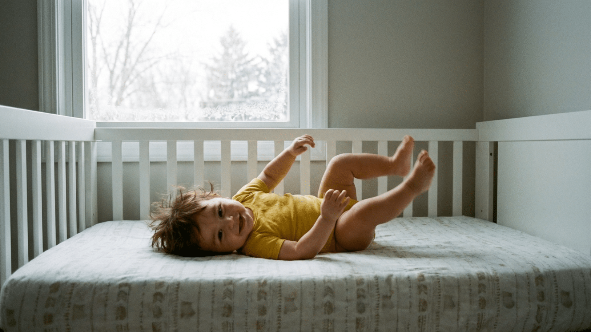 Baby rolling over in crib during sleep milestone