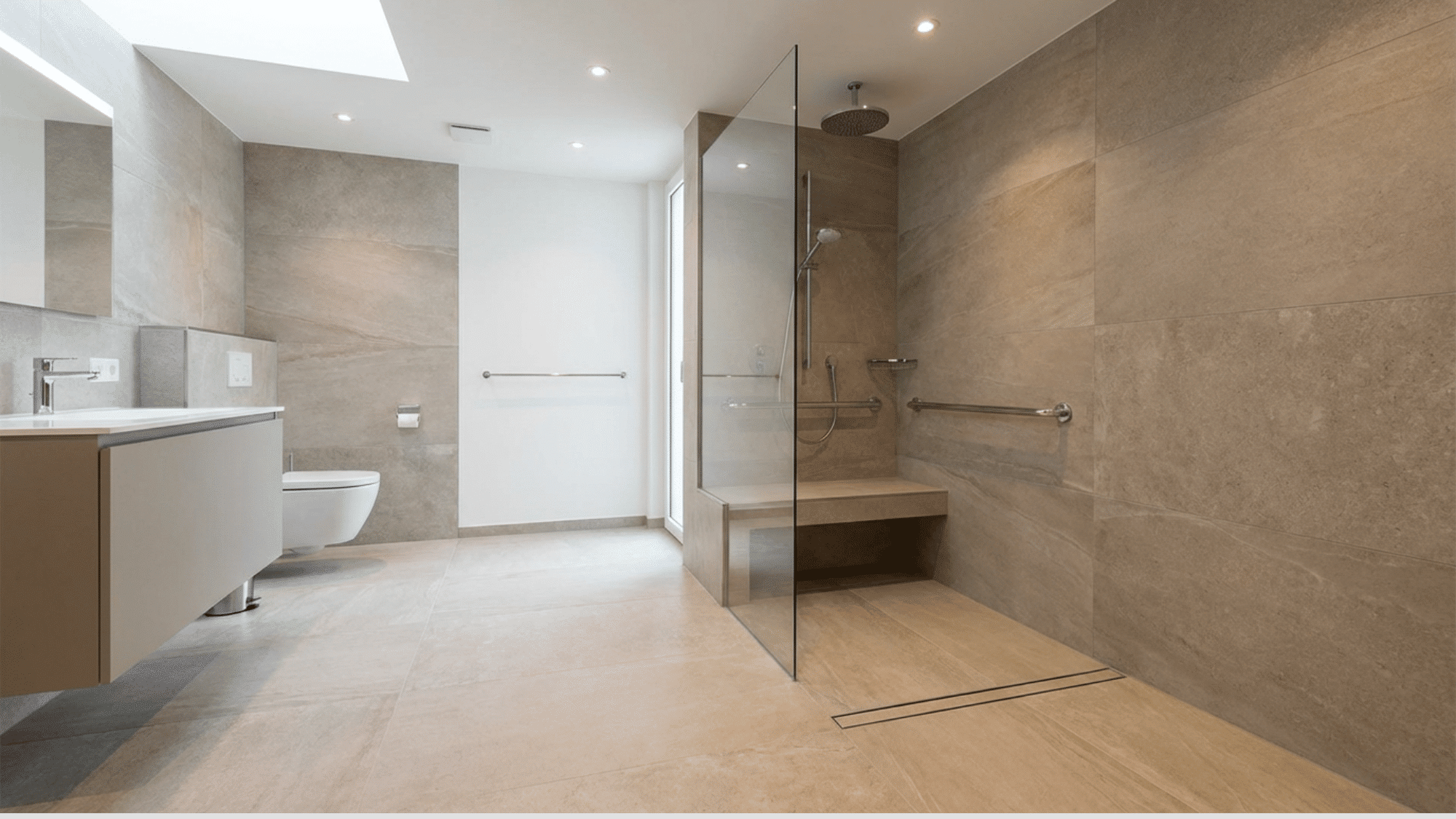Curbless shower with seamless floor design for easy and safe access