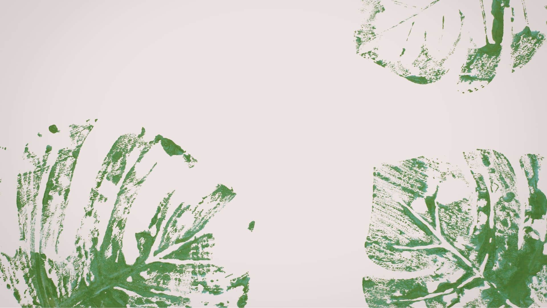 Detailed paint imprints of various leaves showing intricate vein patterns in nature colors