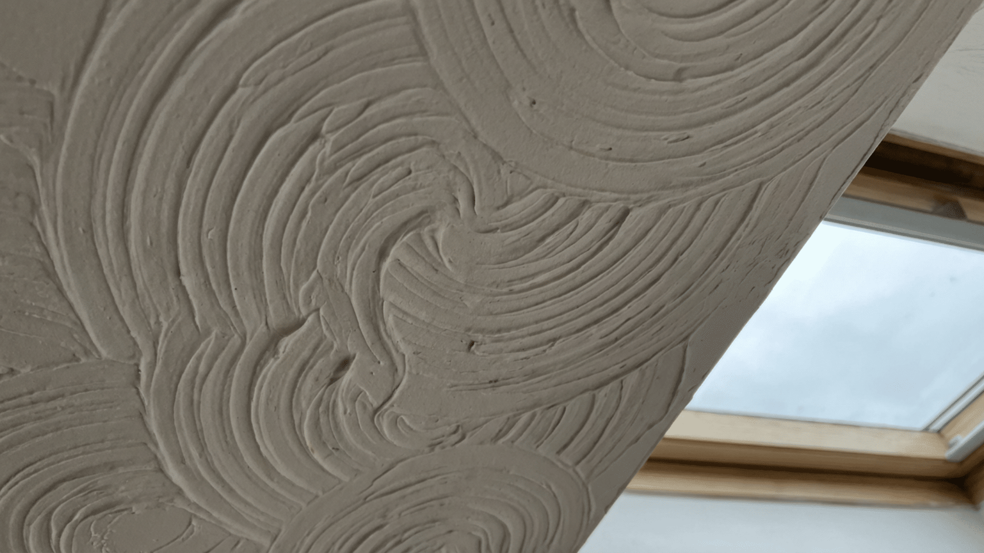 Slap brush wall texture created using drywall compound and brush