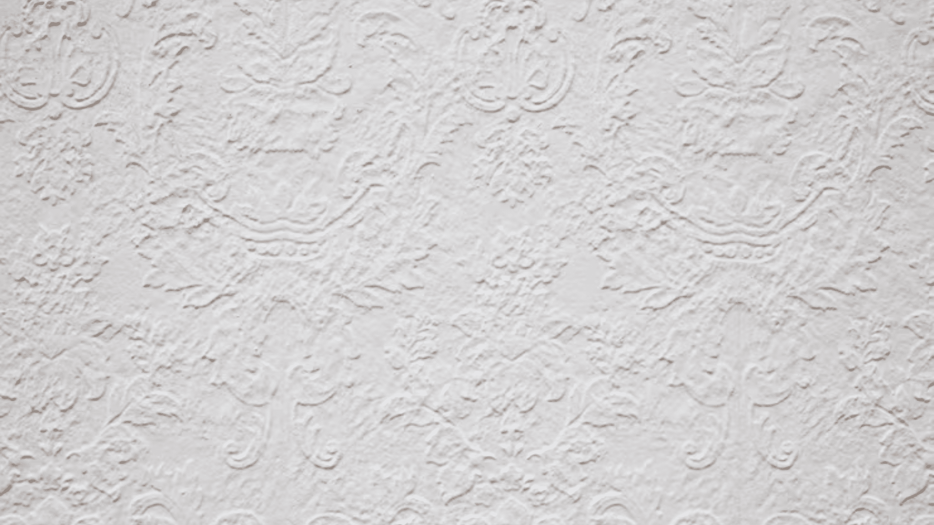 Spanish lace drywall texture pattern on interior wall