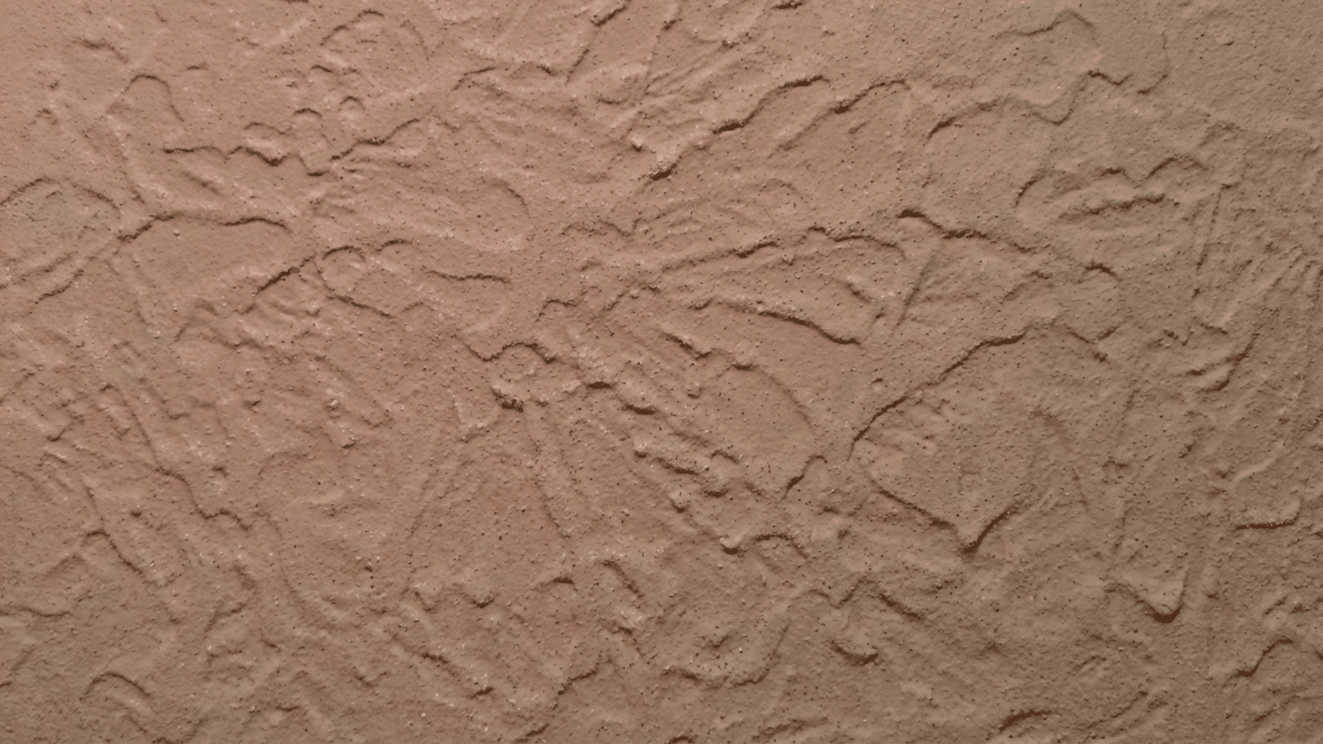 Spray sand wall texture with fine grain drywall finish.