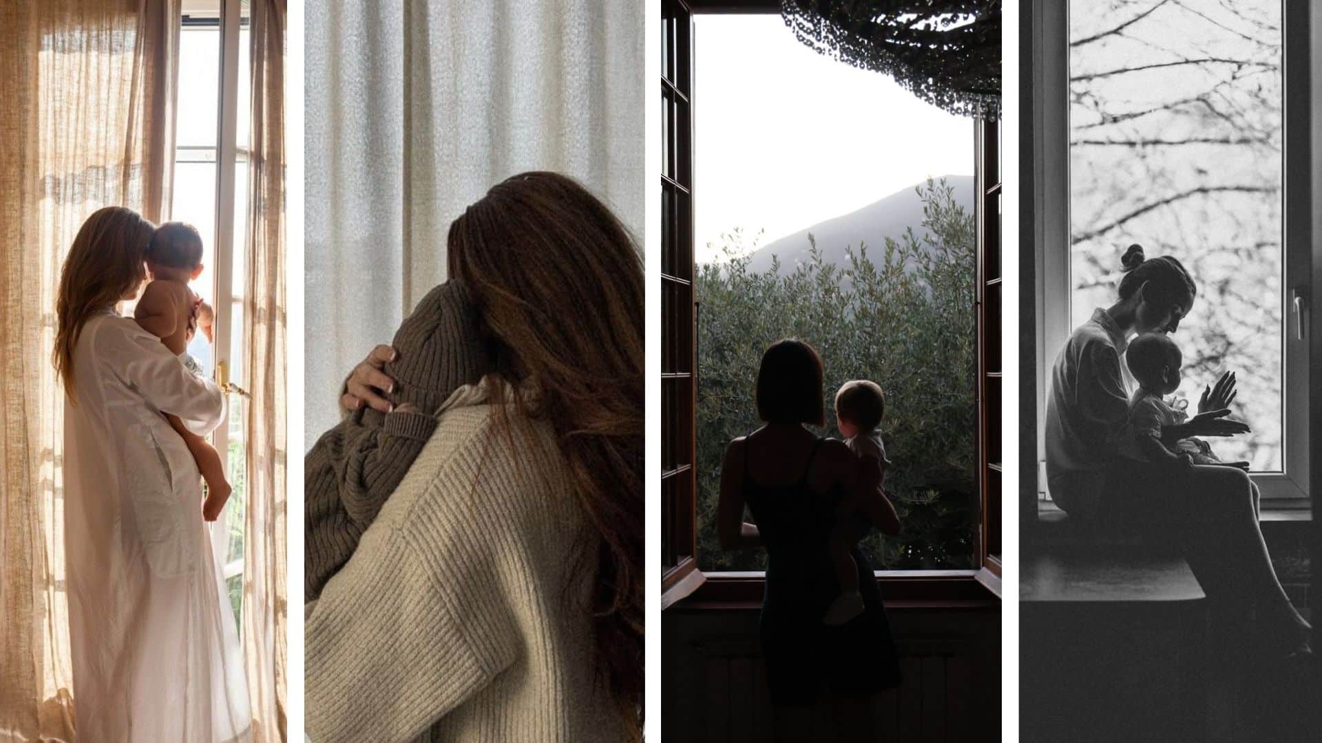 parent holding baby near a window