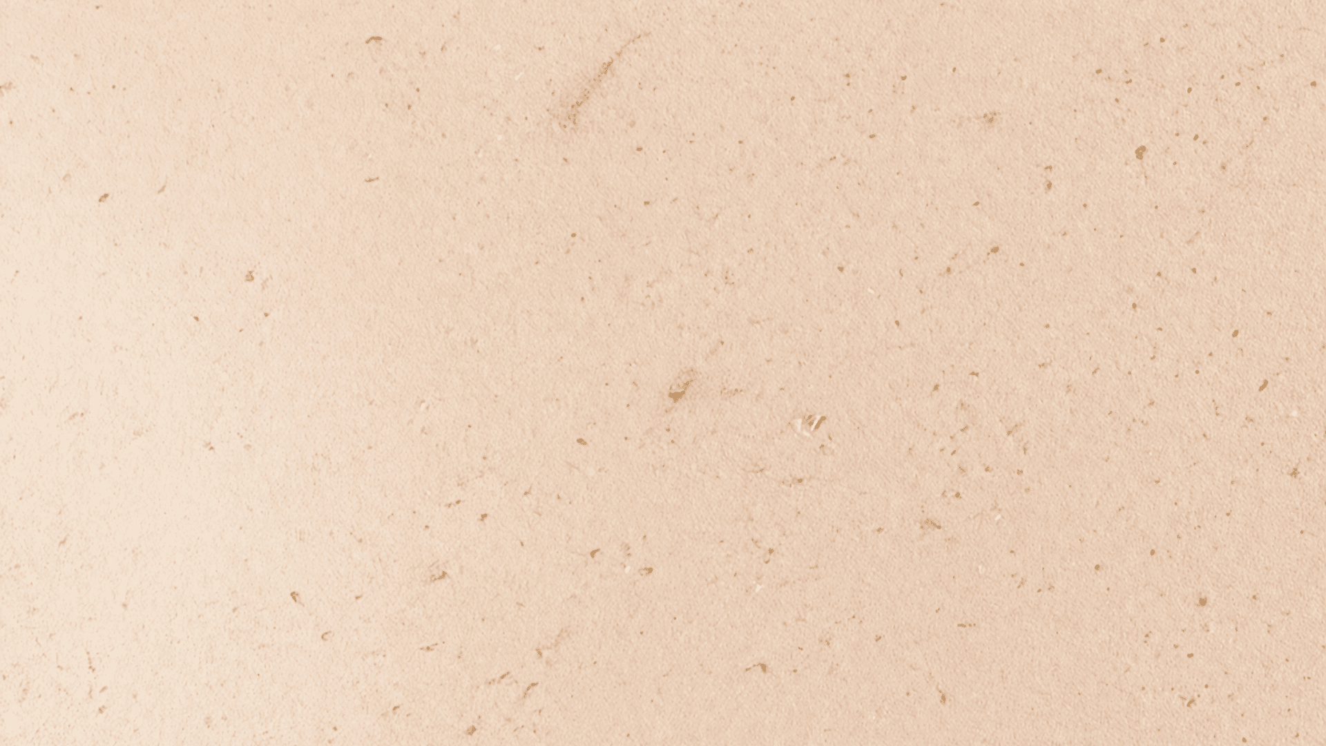 _Close-up of beige Venetian plaster wall with smooth polished finish, subtle variation, matte sheen, and soft lighting depth