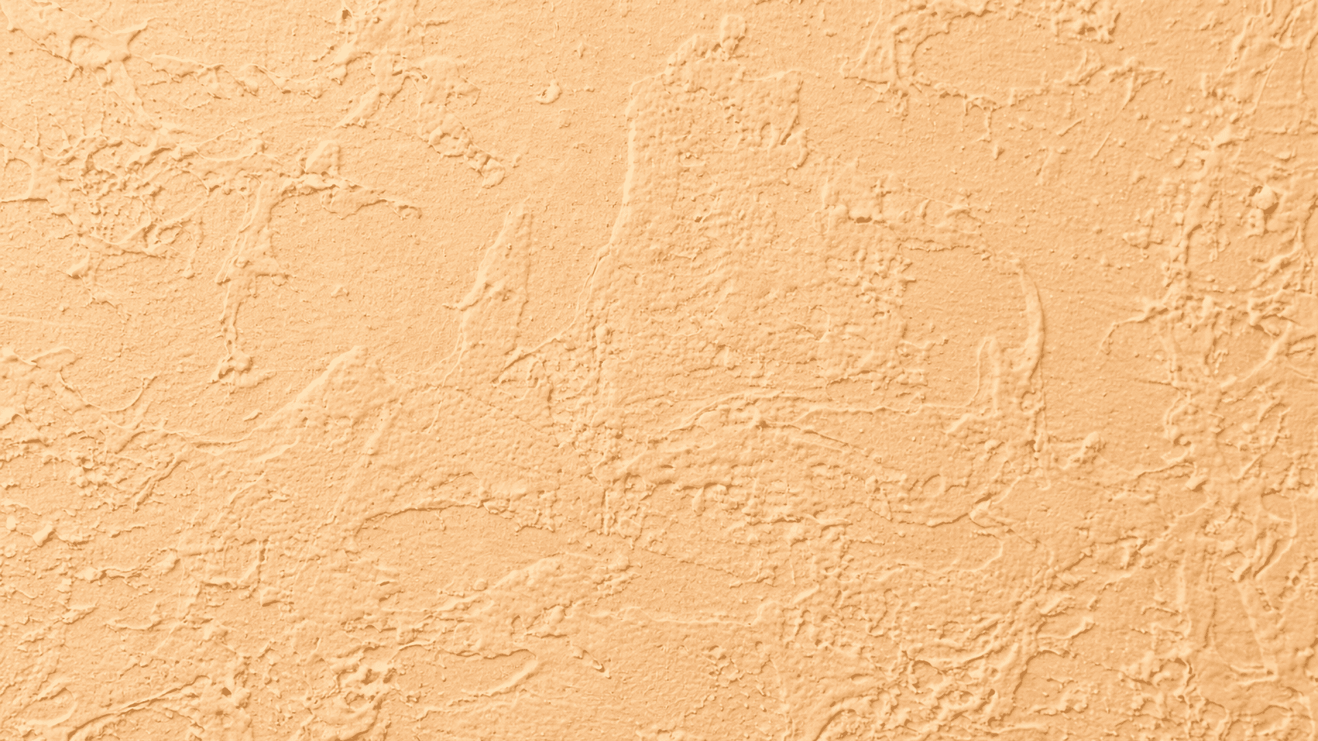 Close-up of beige machine brocade drywall texture with random map-like patterns, matte finish, and soft lighting depth