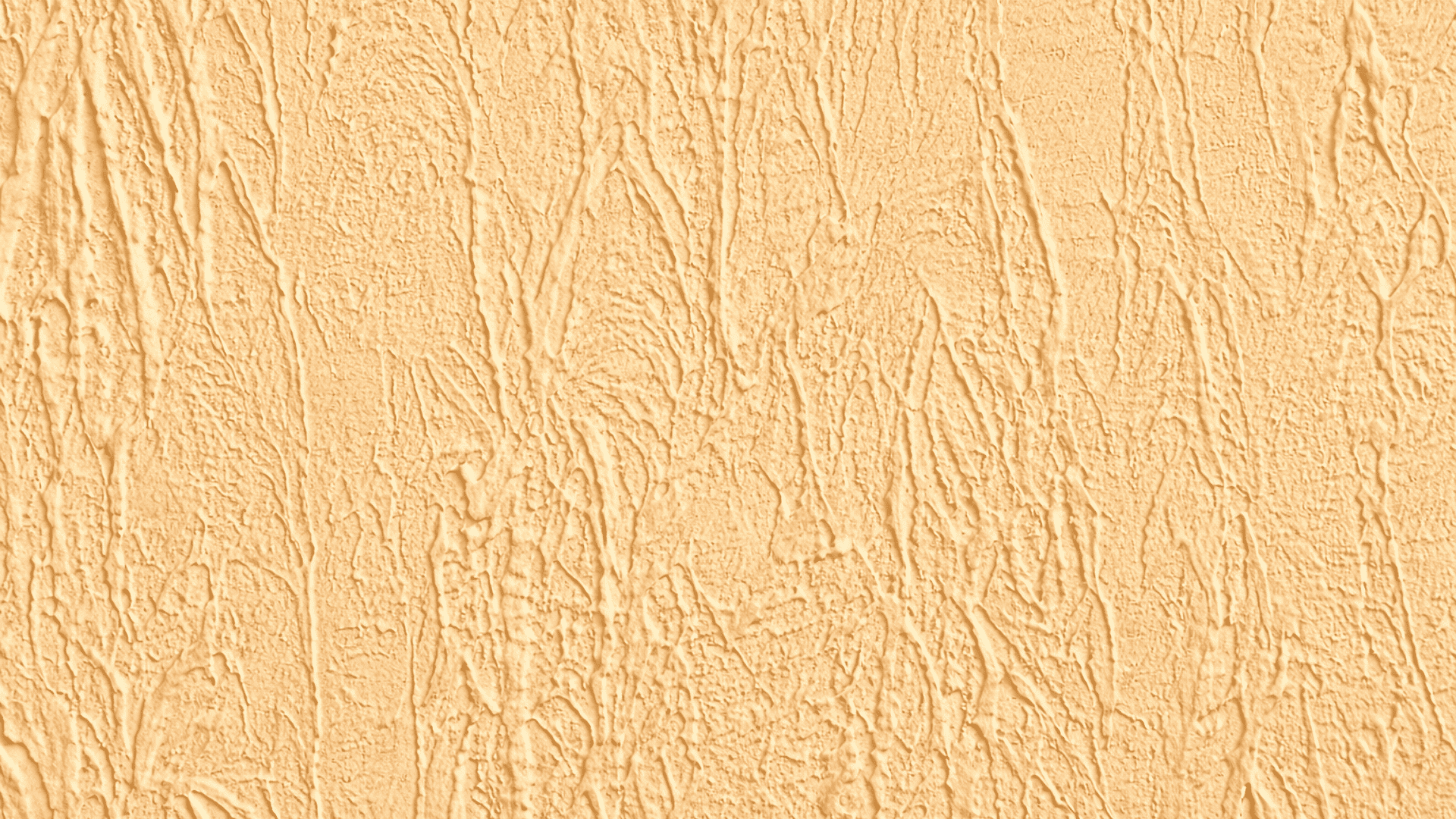 Close-up of beige tree bark drywall texture with vertical ridges, matte finish, and soft lighting highlighting rough detail
