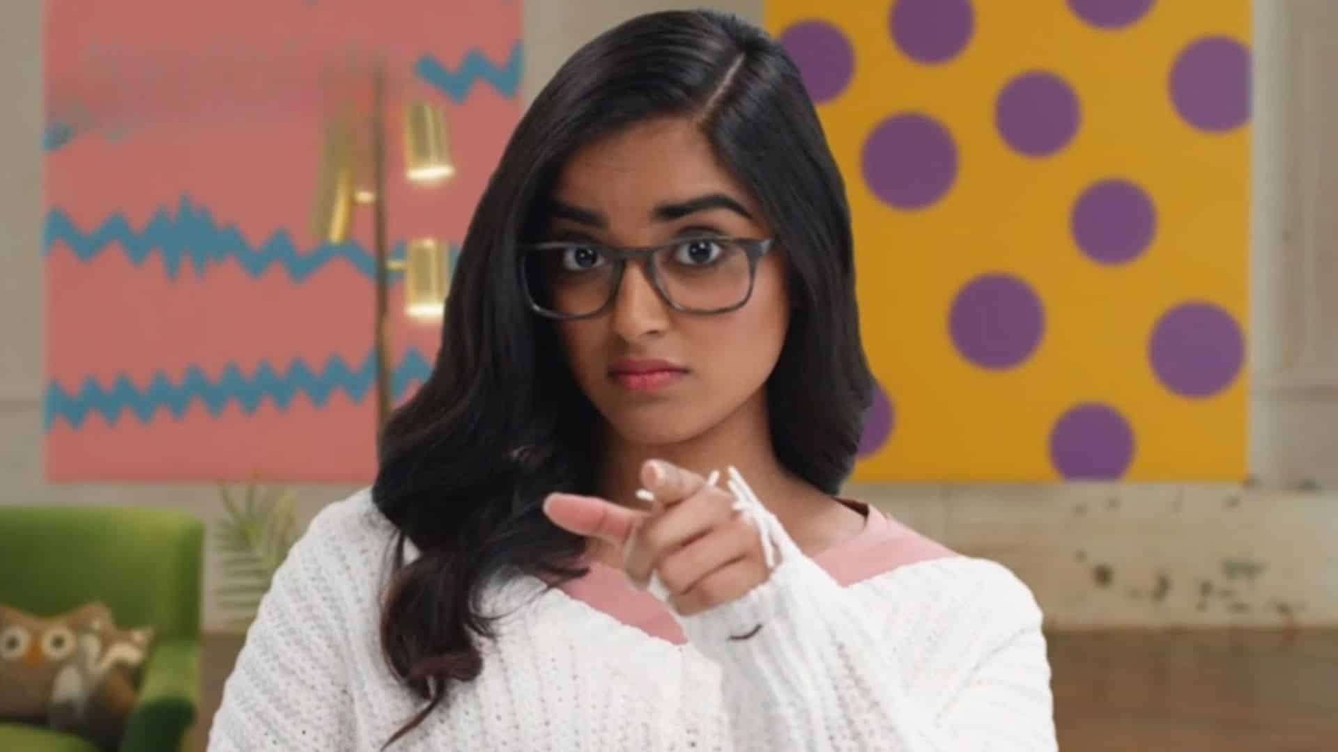 Host from Brainchild pointing toward the viewer during a science lesson, from one of the best educational shows for kids exploring science and facts