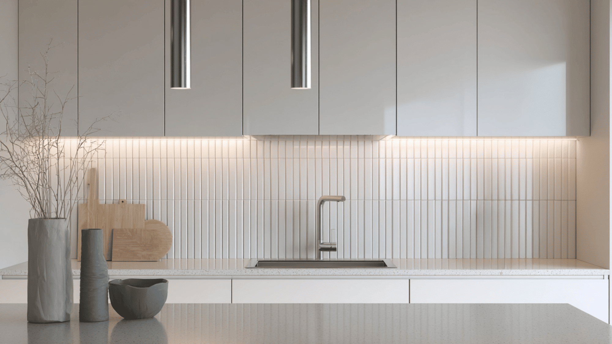 Modern white kitchen with vertical stacked subway tile backsplash