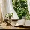 aged poetry book open on a sunlit wooden desk with gardenias and a quill near a garden window