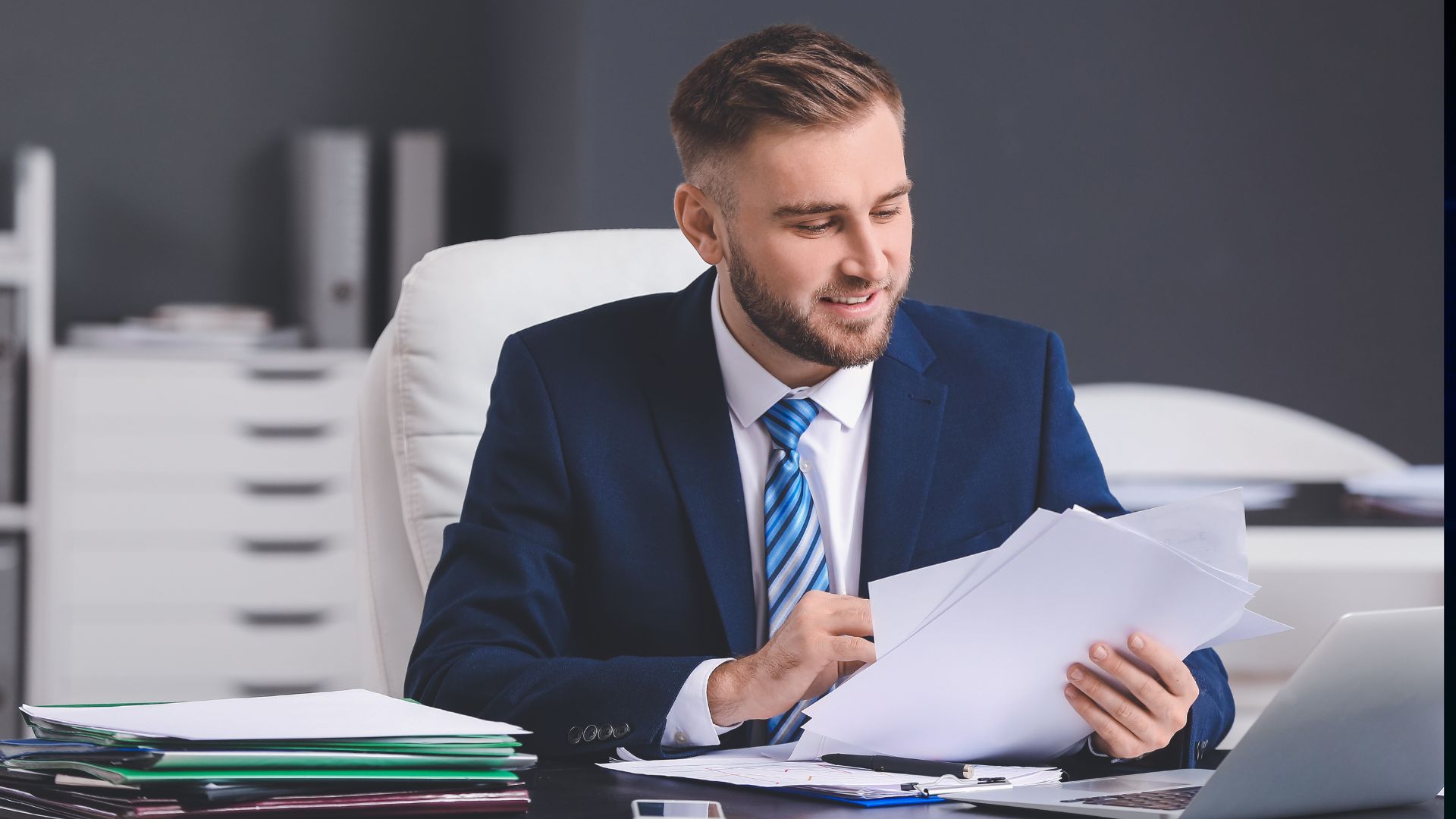 Business professional reviewing financial documents, illustrating common stock debit or credit classification in accounting and equity recording practices