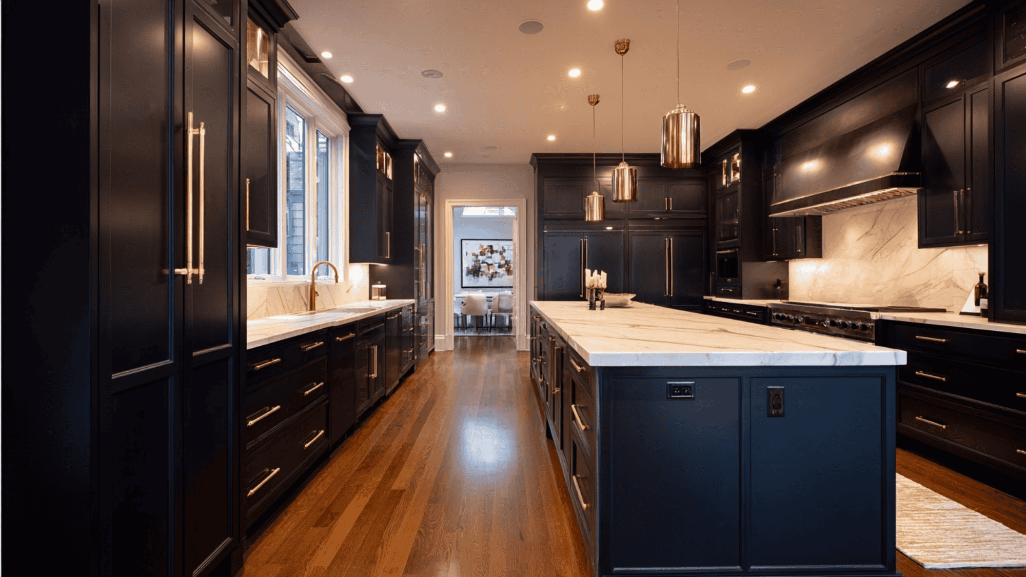 Dark floor-to-ceiling kitchen cabinets with a modern moody look