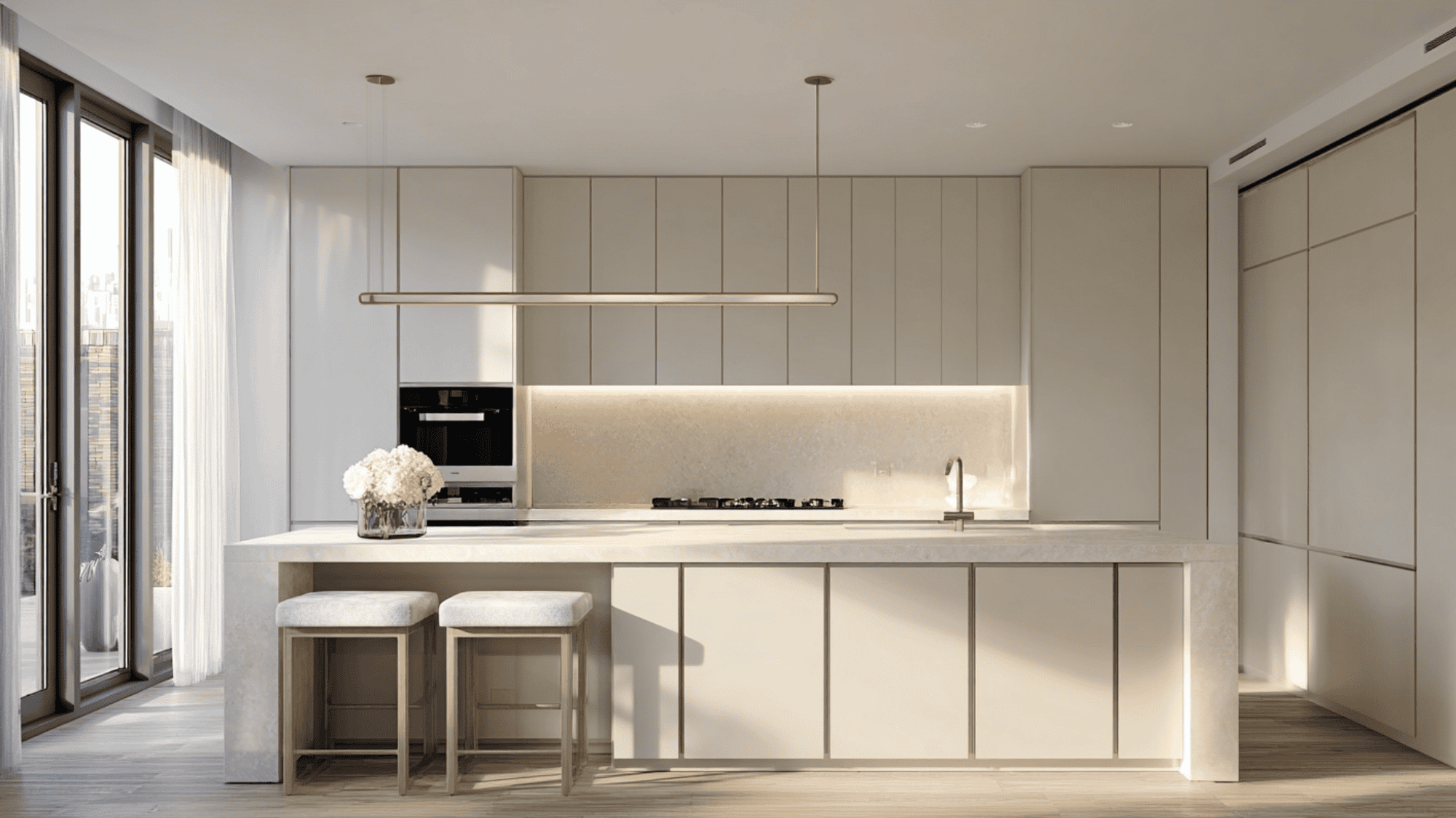 Handleless floor-to-ceiling kitchen cabinets with a clean look