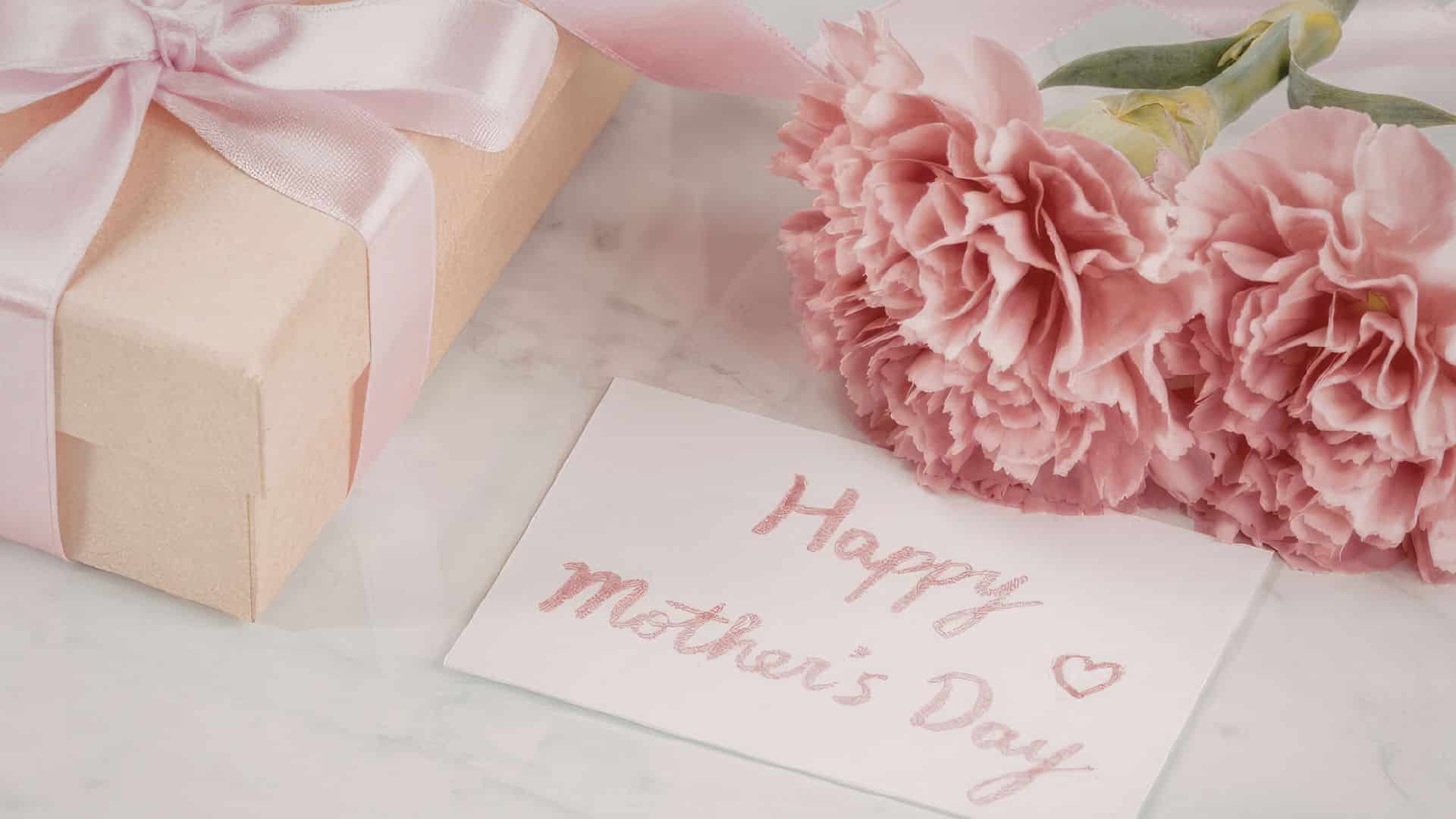 Illustration of a mother and daughter hugging with the text 'Happy Mother's Day,' symbolizing love and a heartfelt Mother's Day prayer