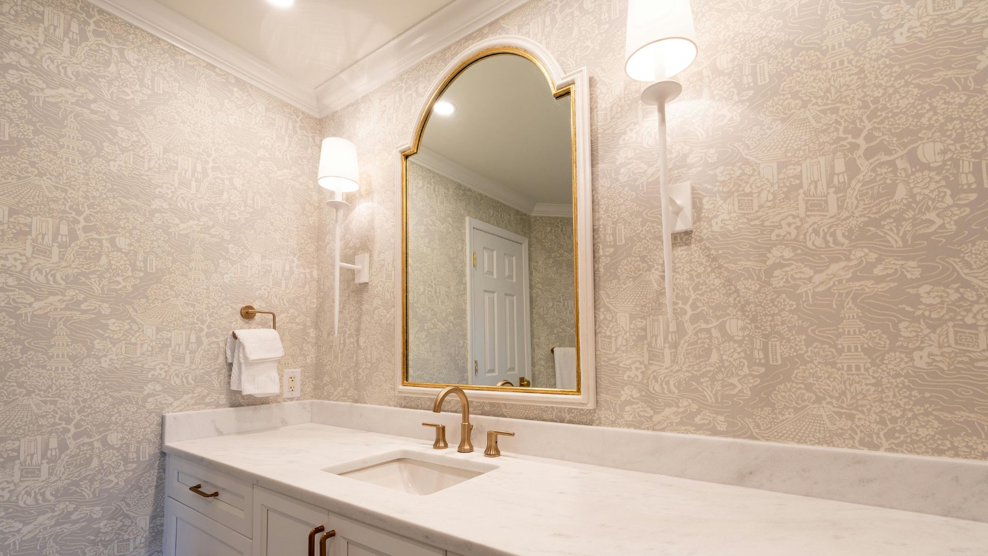 metallic accents such as gold faucet and fixtures adding elegance contrast and a refined look to bathroom decor