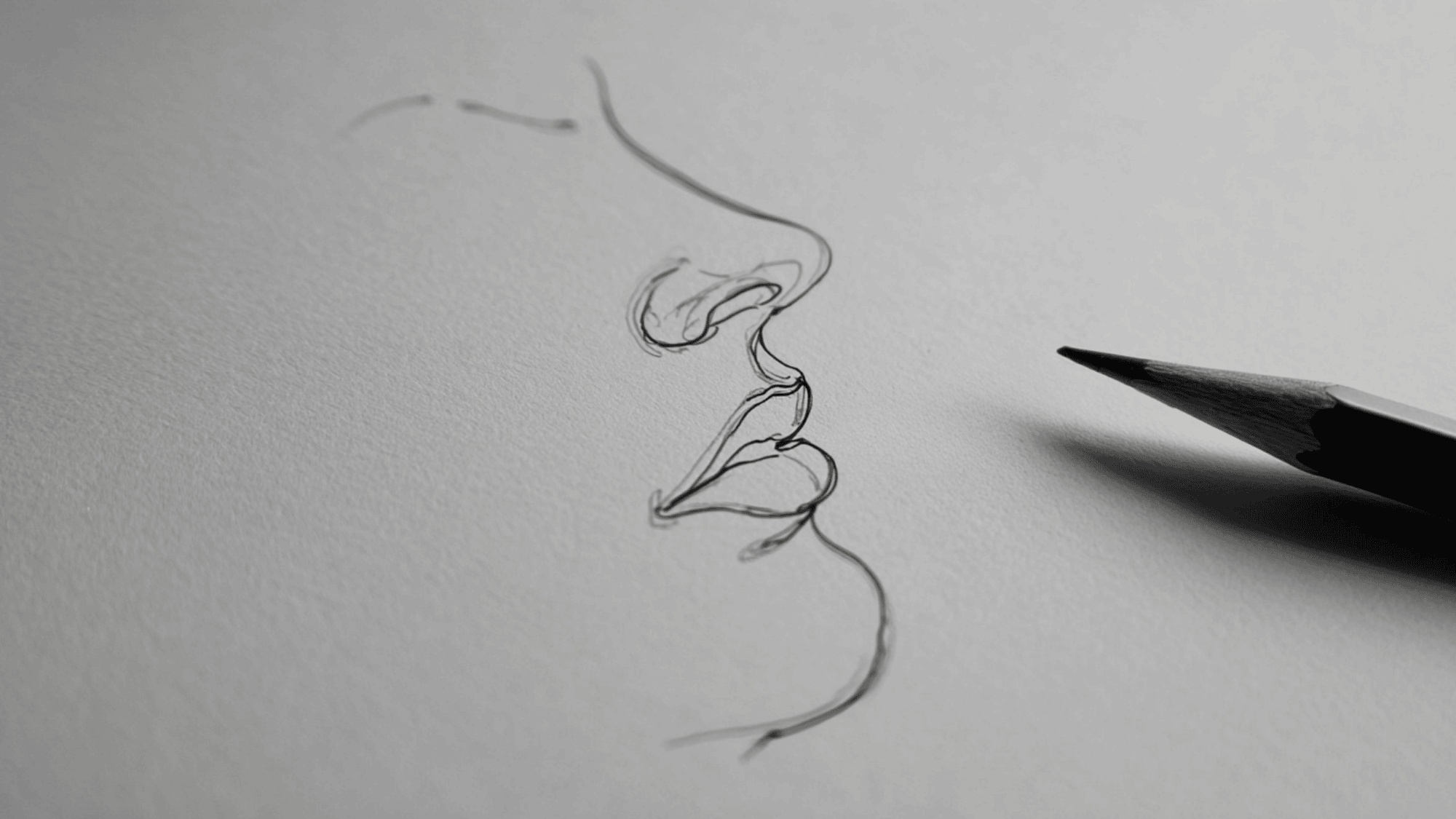 Single line drawing of a face showing continuous line exercise