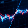 Split-screen trading chart showing diverging price action between two correlated markets, highlighting SMT divergence with contrasting trends.