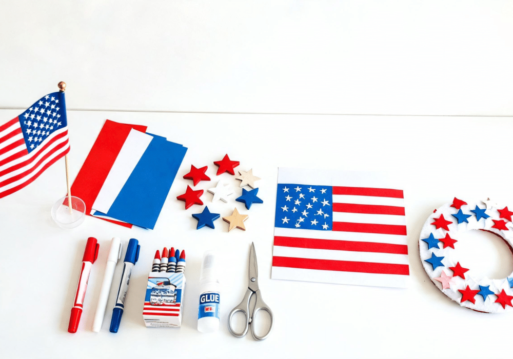 Collection of Memorial Day crafts including flags and art supplies arranged on a table