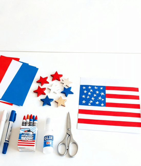 Collection of Memorial Day crafts including flags and art supplies arranged on a table