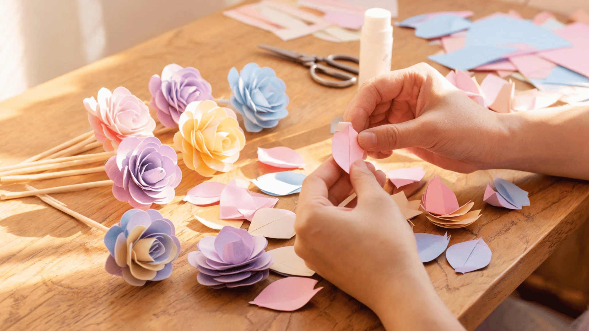 Finished colorful paper flowers arranged together before bouquet assembly. (1)