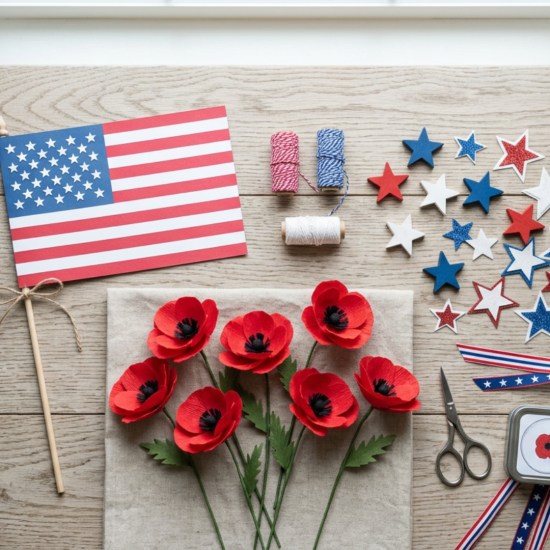 Memorial Day crafts with flag poppy and star decorations arranged on a clean light wooden surface