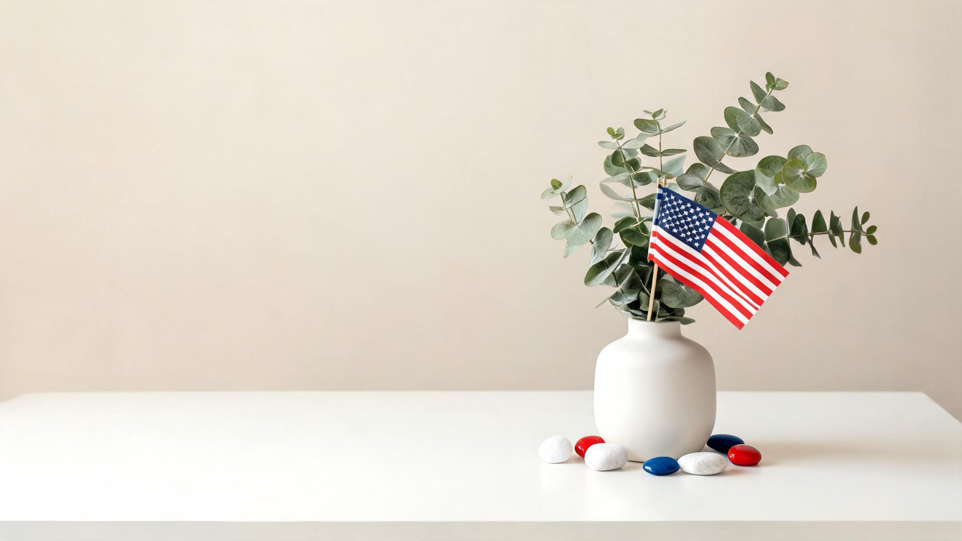 Minimal Memorial Day table with a simple centerpiece and small patriotic accents