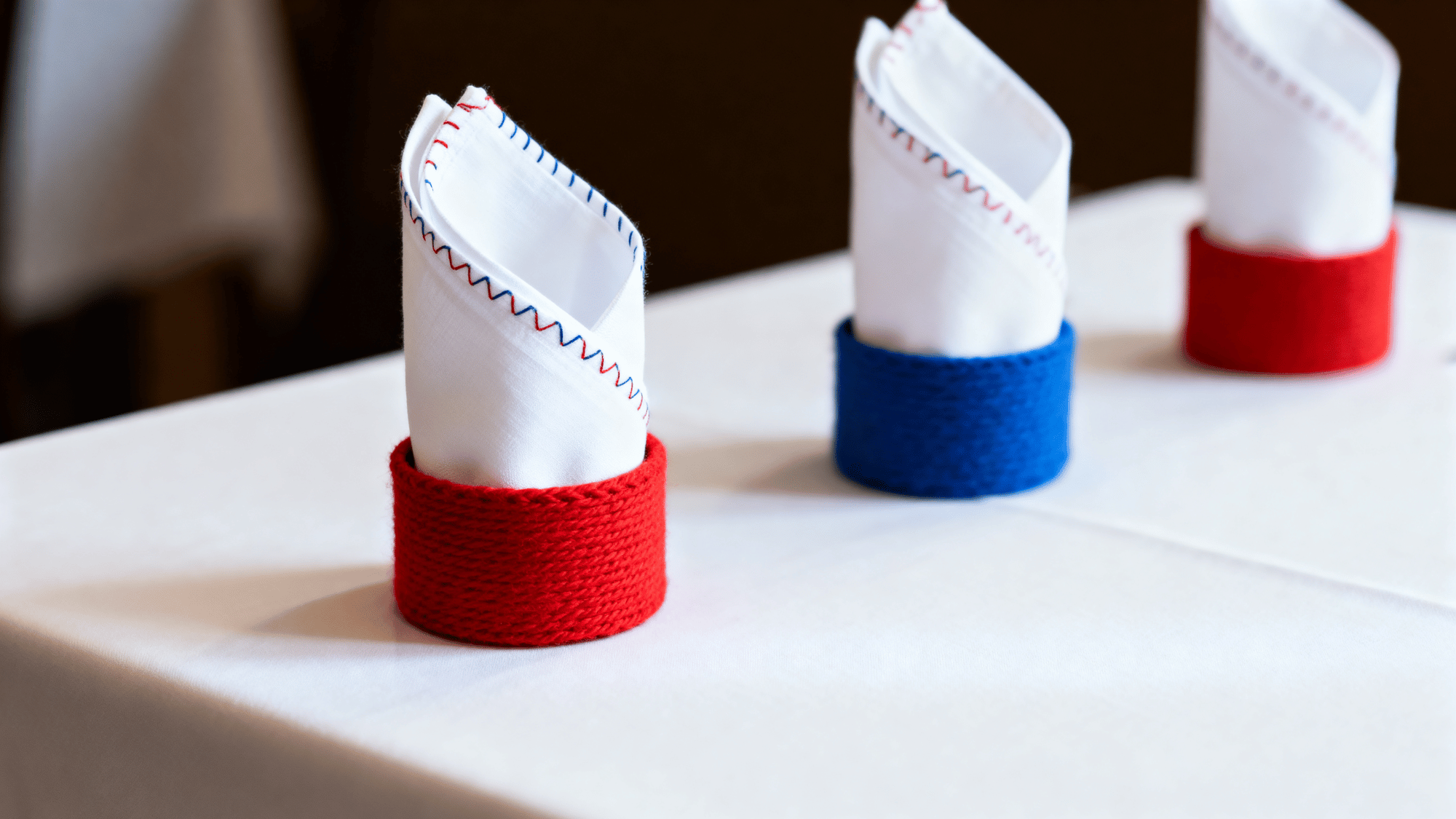 Napkins in patriotic rings on simple table