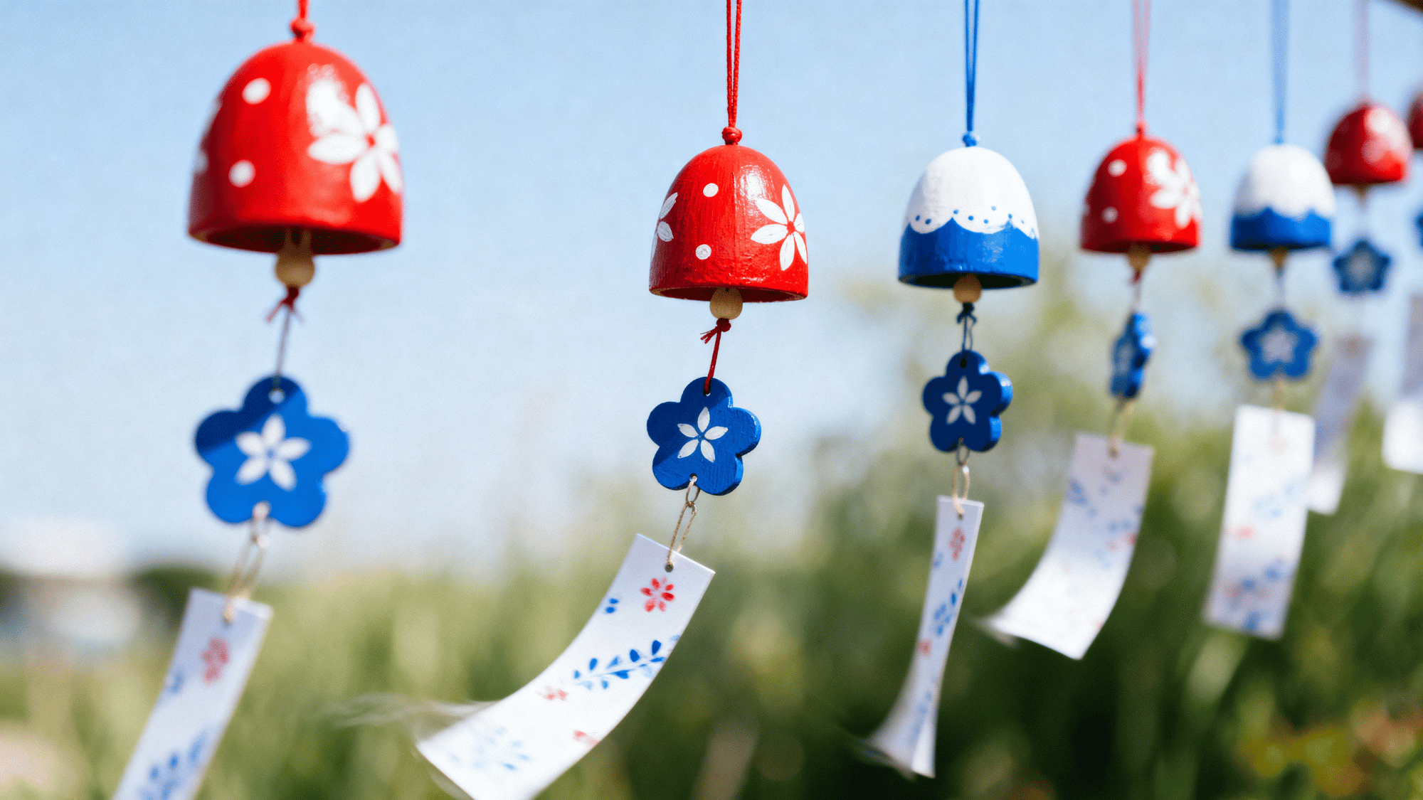 Red white blue wind chimes hanging outdoors