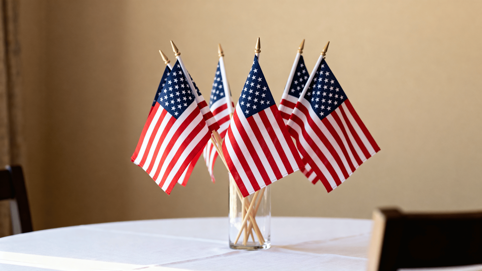 Small flag centerpiece on simple table